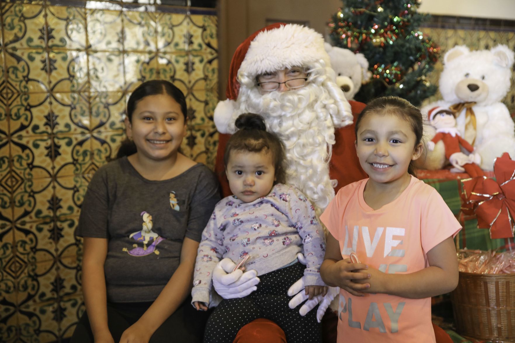 Toys for Tots children with Santa